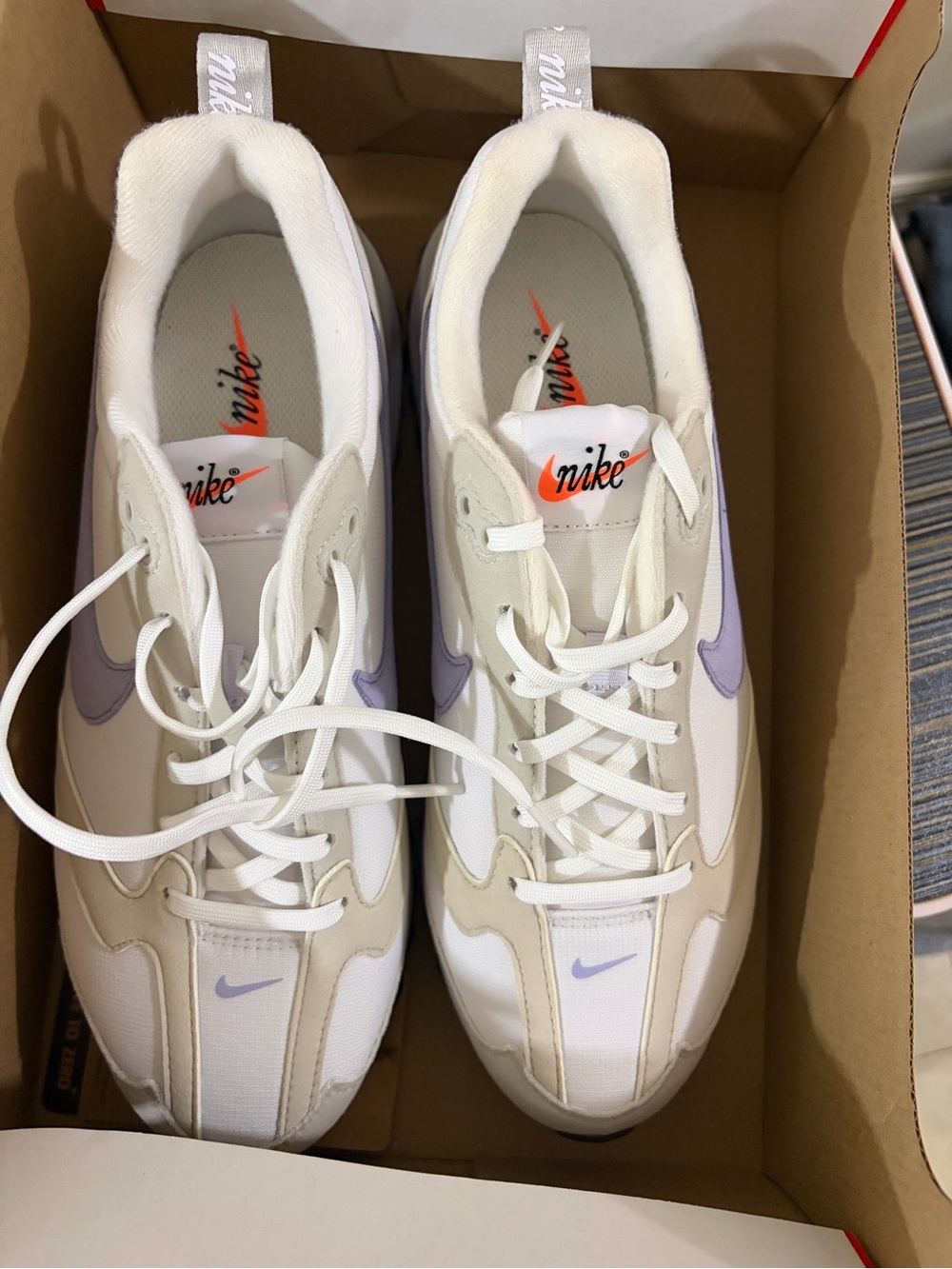 Nike Women's  Airmax Dawn: White Sneakers with Lavender Swoosh and Orange Logo
